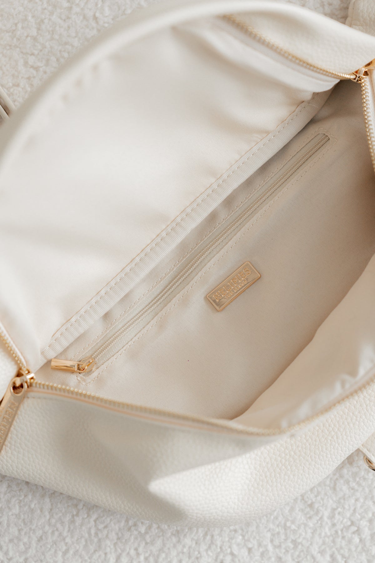 BAUCHTASCHE IN LEDEROPTIK CREME